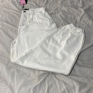 White jogger jeans with black stitching. Size 6. Pretty little thing